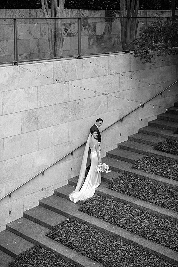 Nasher Sculpture Center Wedding Bride and Groom walking up stairs